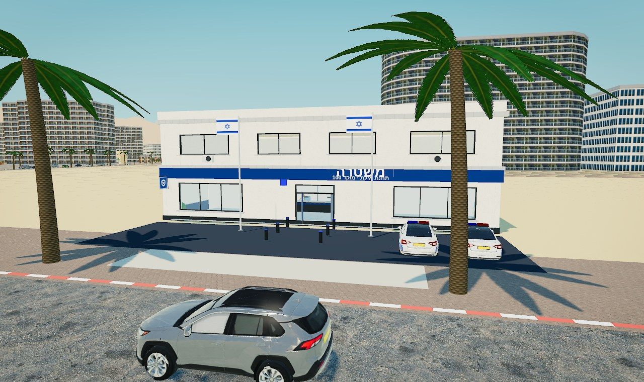 תחנת המשטרה של אילת עם ניידות בחניה